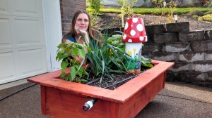 Jessica with one of her smaller raised-beds.